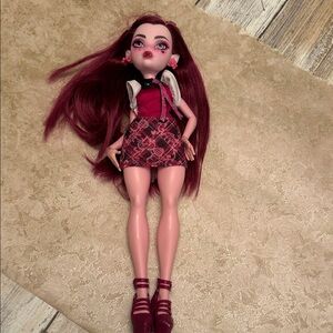 Fashion Doll with Red Hair and Plaid Skirt